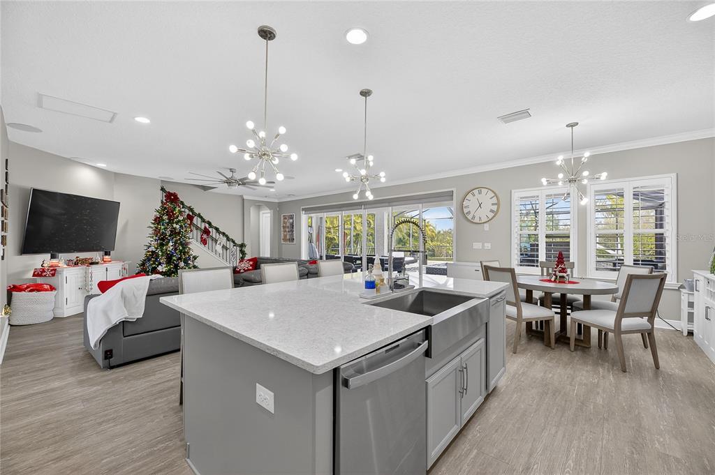7424 Paradiso Drive Apollo Beach, FL 33572 - Photo 43 of 99 a view of a dining room with furniture window and wooden floor