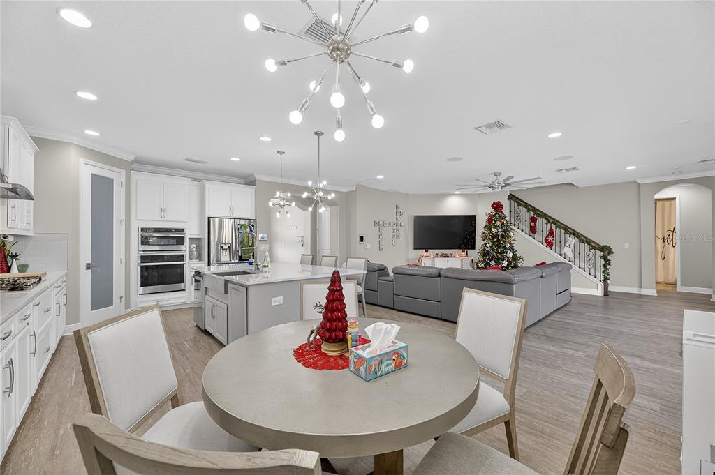 7424 Paradiso Drive Apollo Beach, FL 33572 - Photo 47 of 99 a living room with fireplace furniture and a flat screen tv