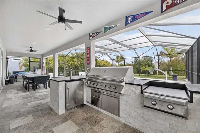 a view of a livingroom with furniture and a flat screen tv
