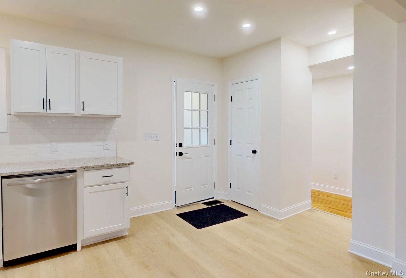 548 Dosen Road Middletown, NY 10940 - Photo 16 of 41 Doorway to outside with wood finished floors and recessed lighting