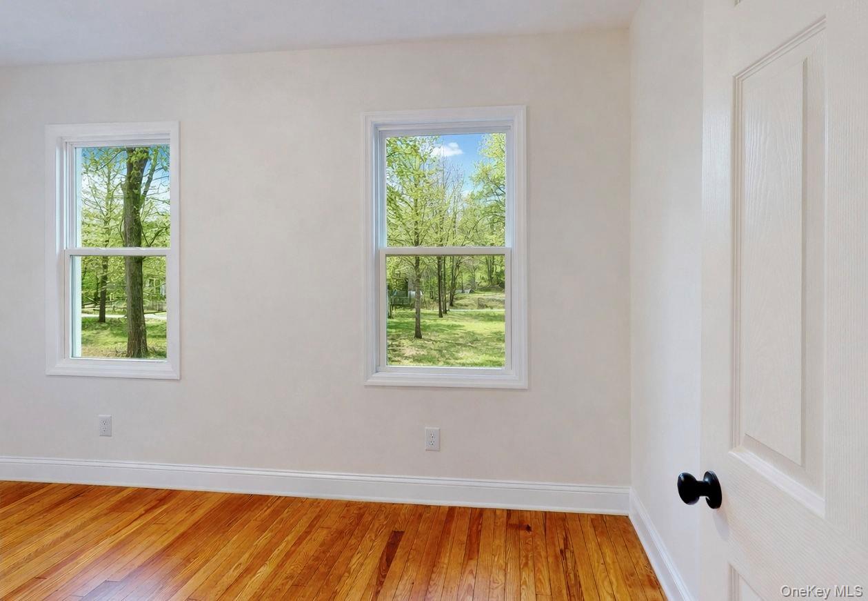 548 Dosen Road Middletown, NY 10940 - Photo 19 of 41 Empty room with light wood-style floors and plenty of natural light