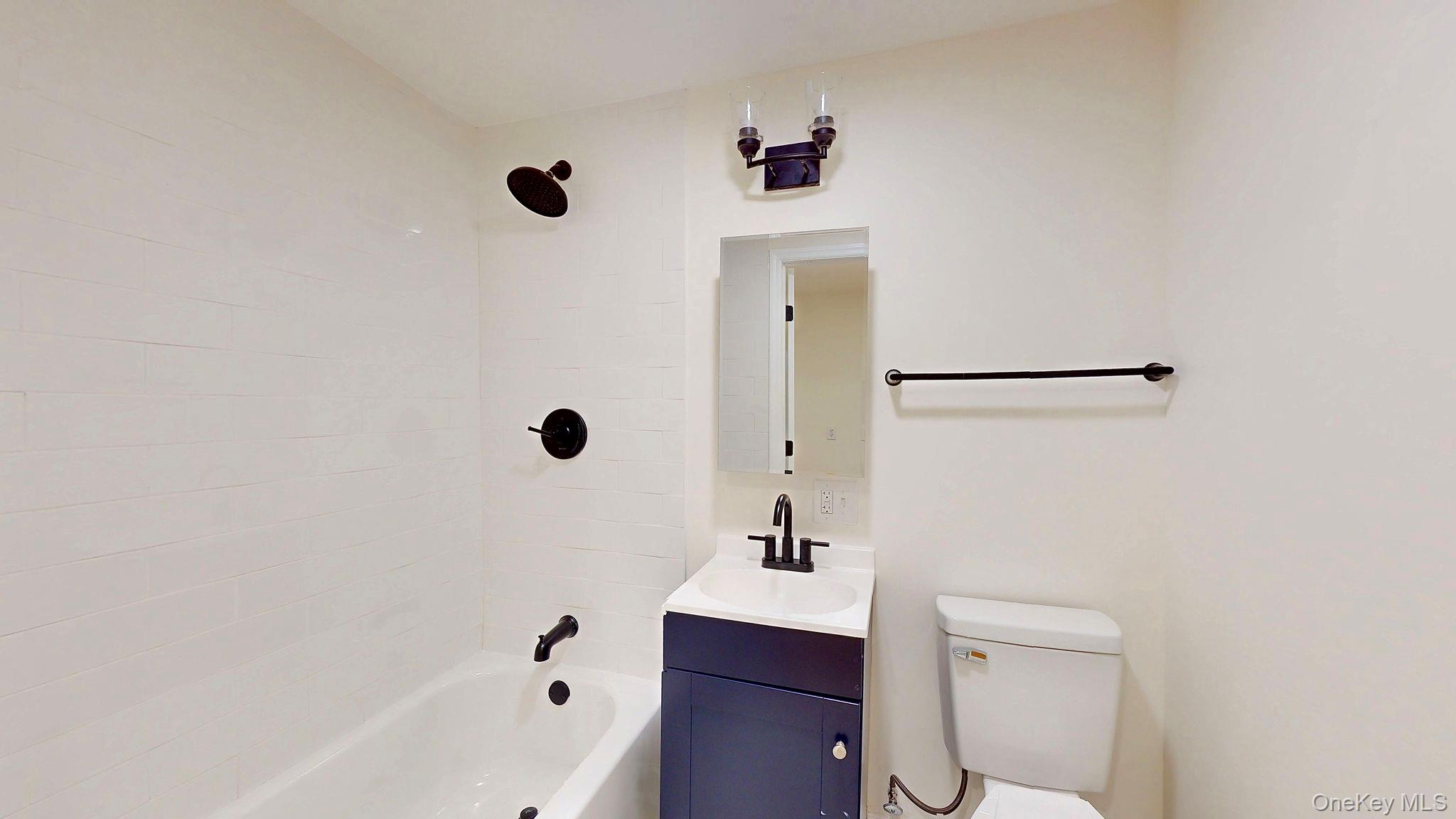 548 Dosen Road Middletown, NY 10940 - Photo 24 of 41 Bathroom with vanity and bathing tub / shower combination