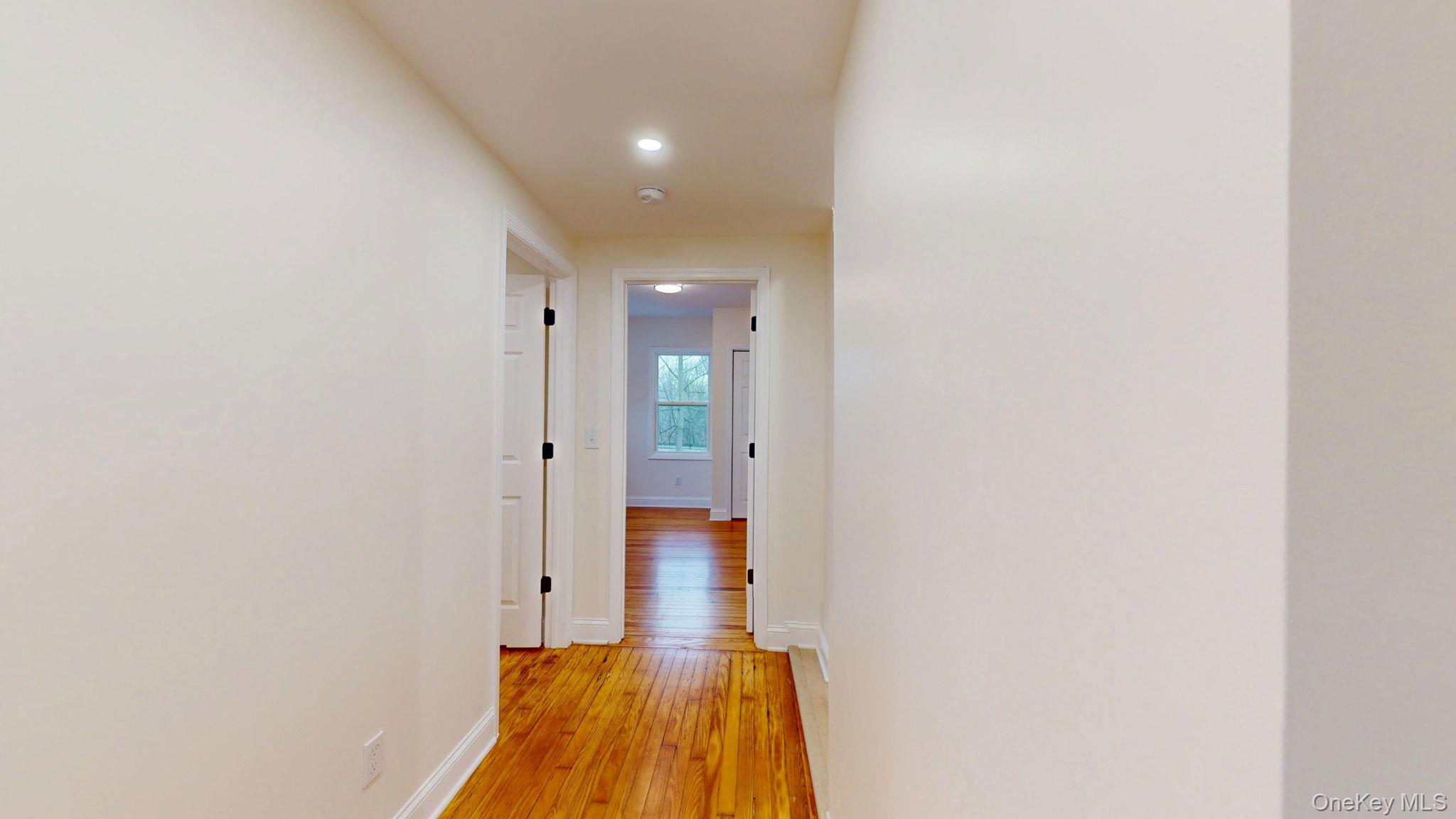 548 Dosen Road Middletown, NY 10940 - Photo 26 of 41 Hallway featuring light wood finished floors and recessed lighting