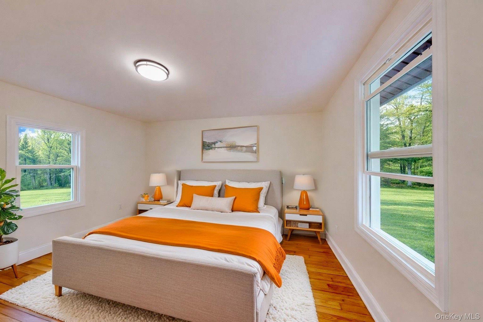 548 Dosen Road Middletown, NY 10940 - Photo 31 of 41 Bedroom featuring light wood finished floors and multiple windows