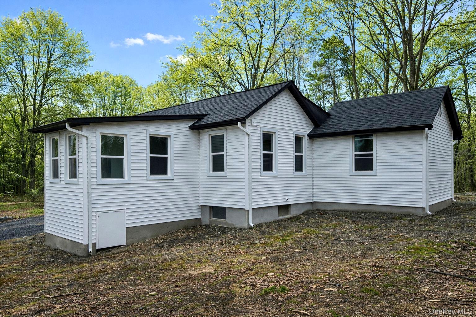 548 Dosen Road Middletown, NY 10940 - Photo 4 of 41 Rear view of house featuring roof with shingles