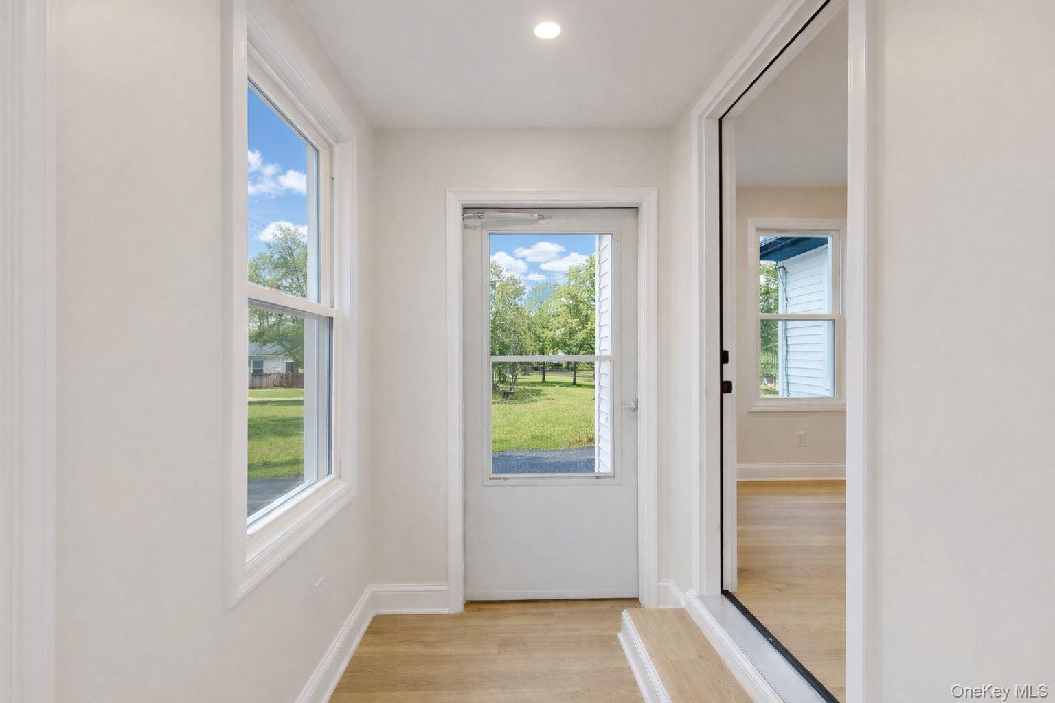 548 Dosen Road Middletown, NY 10940 - Photo 6 of 41 Entryway featuring wood finished floors, plenty of natural light, and recessed lighting