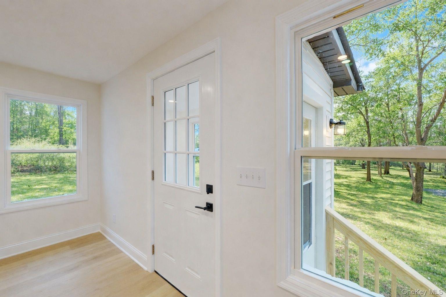 548 Dosen Road Middletown, NY 10940 - Photo 7 of 41 Entryway with baseboards and wood finished floors