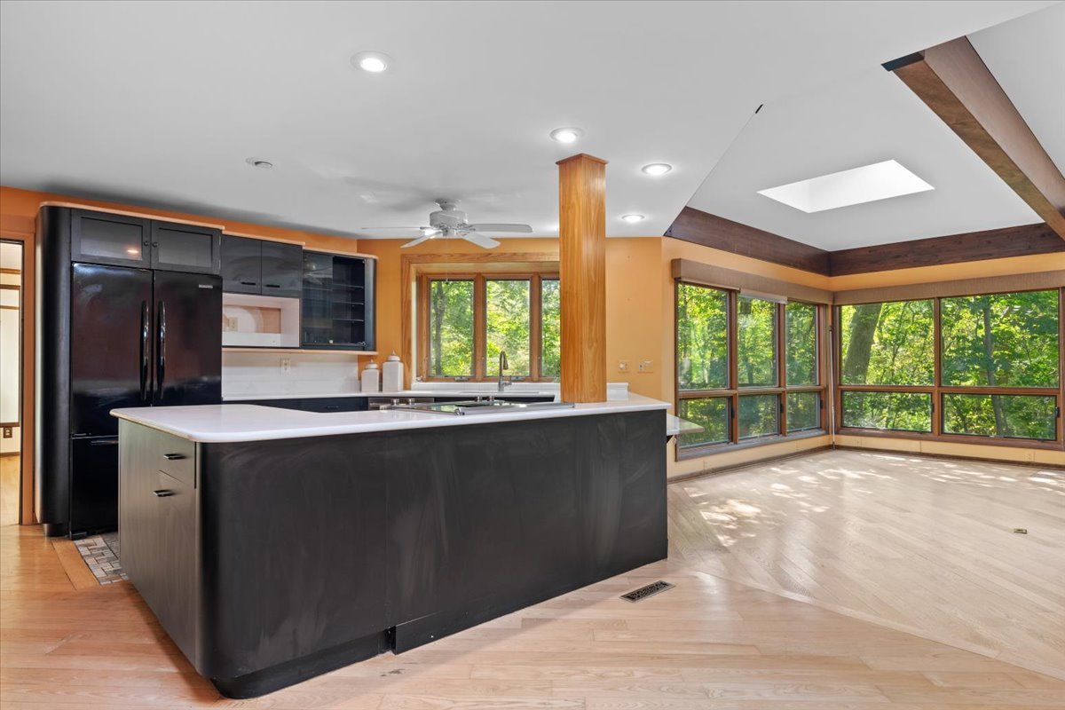 5N380 Ronsu Lane St. Charles, IL 60175 - Photo 13 of 48 a view of a kitchen with a sink and a large window