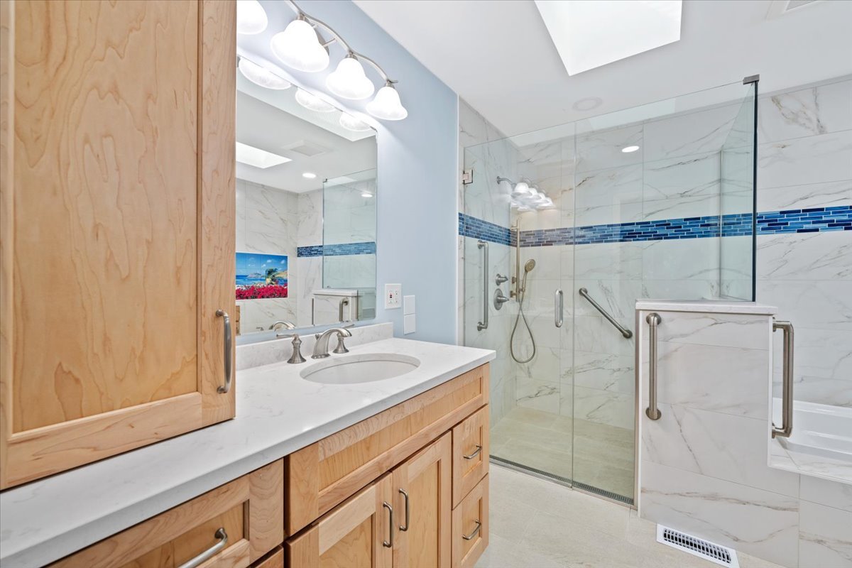 5N380 Ronsu Lane St. Charles, IL 60175 - Photo 29 of 48 a bathroom with a sink and a mirror