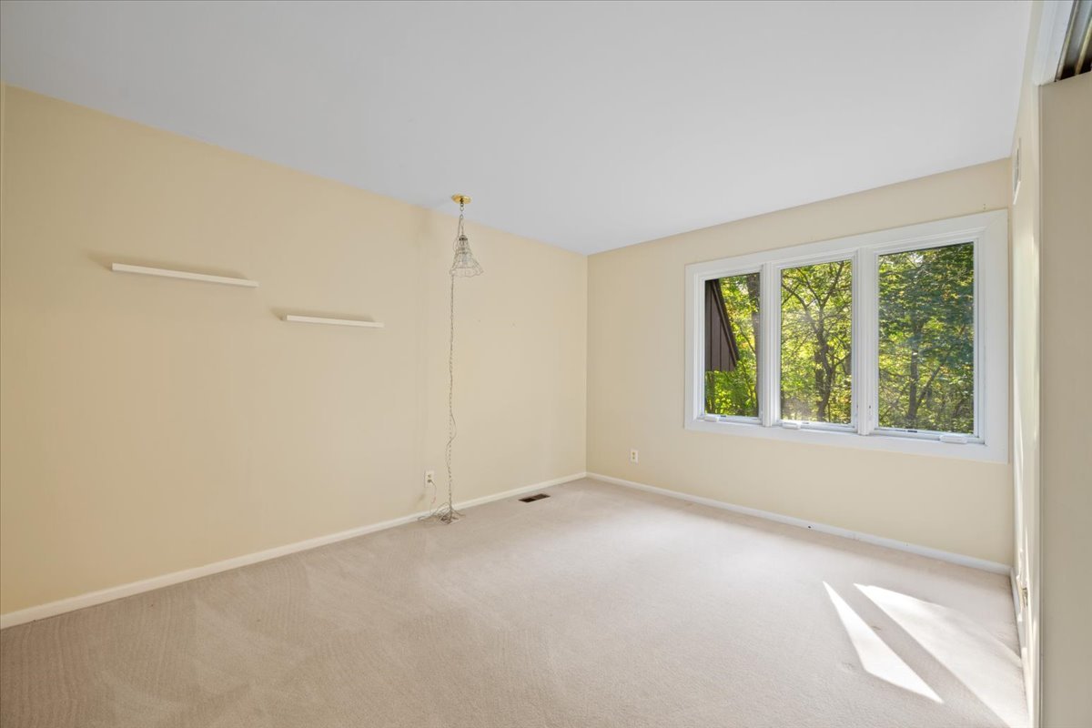 5N380 Ronsu Lane St. Charles, IL 60175 - Photo 33 of 48 an empty room with windows