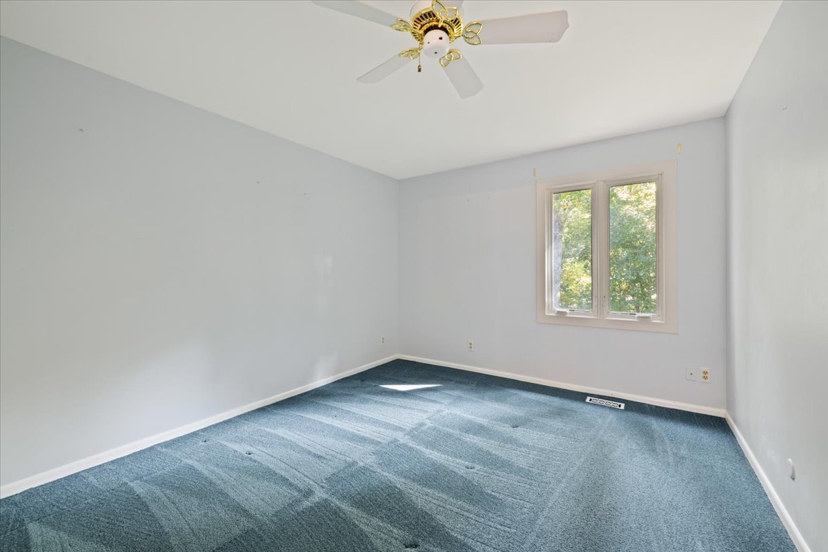 5N380 Ronsu Lane St. Charles, IL 60175 - Photo 34 of 48 wooden floor in an empty room with a window