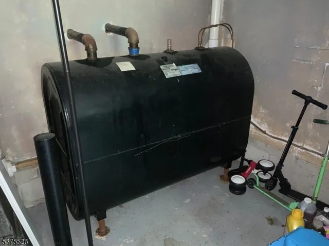 a bed room with furniture and a mirror