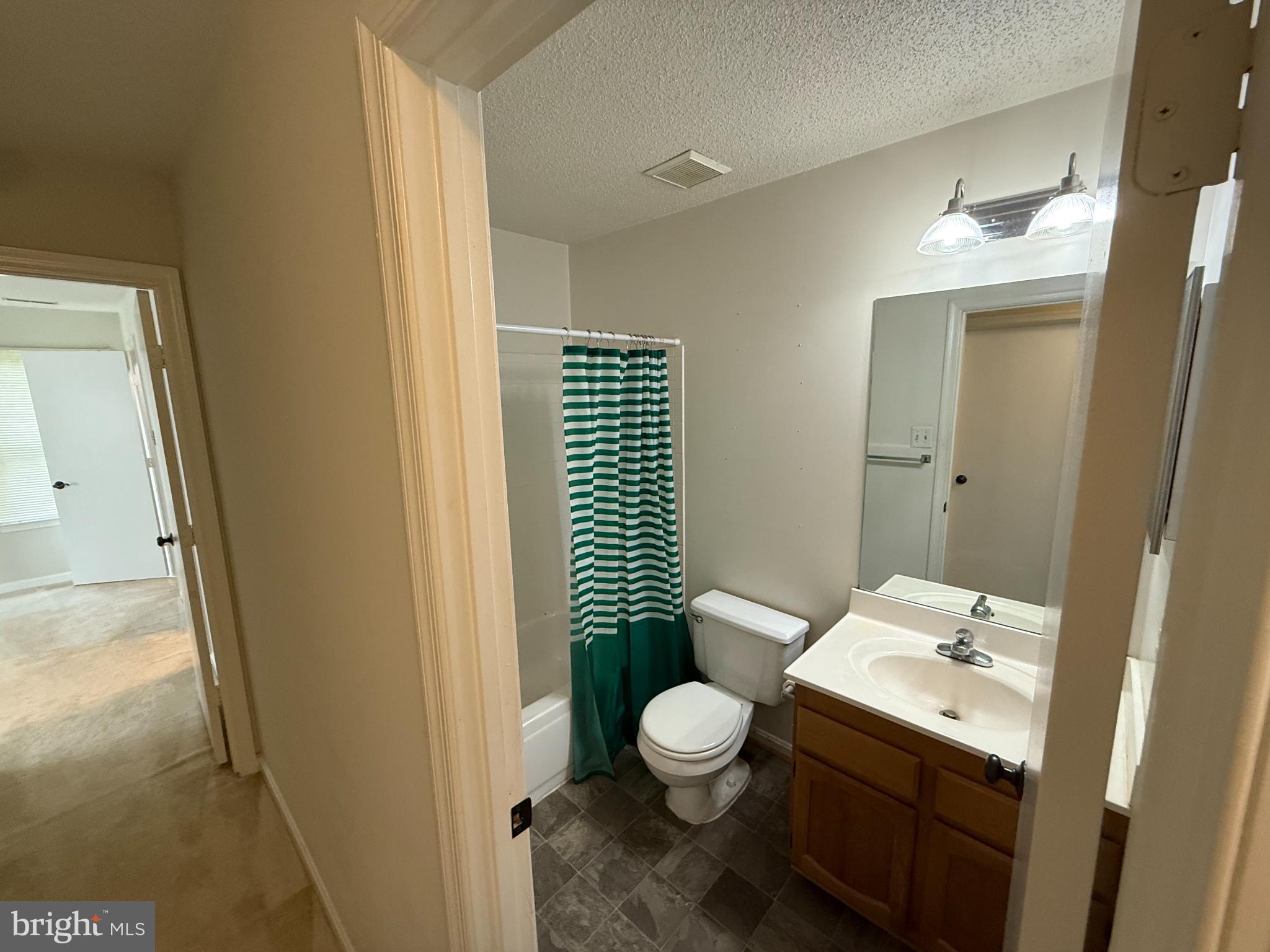 2600 Camelback Lane, Unit 9 Silver Spring, MD 20906 - Photo 12 of 16 Bright and inviting bathroom with modern touches.