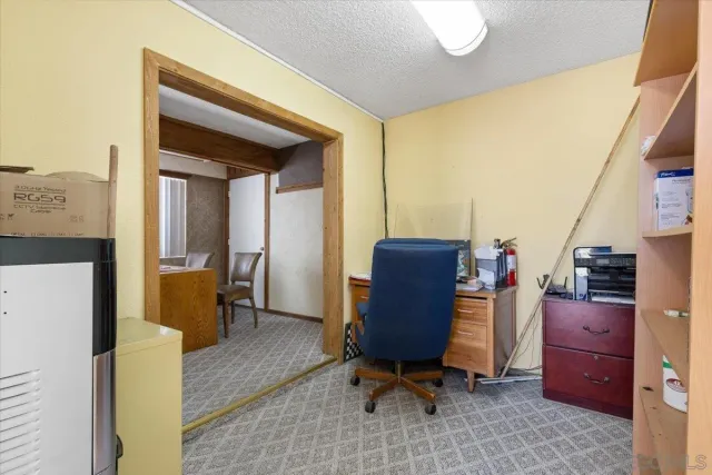 a view of building with yard