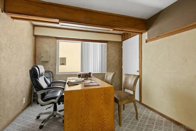 a front view of a building with street view