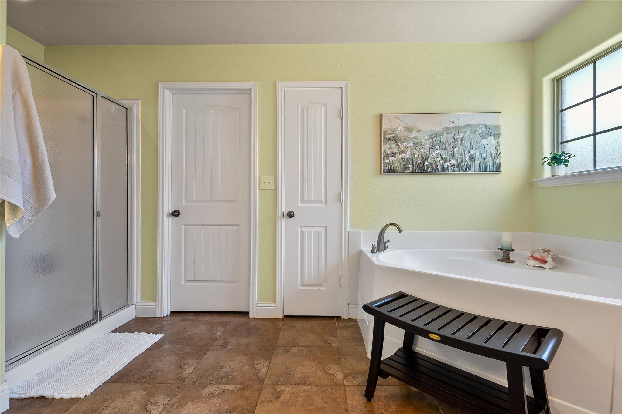 3106 128th Street Lubbock, TX 79423 - Photo 27 of 44 a bathroom with a sink and a mirror