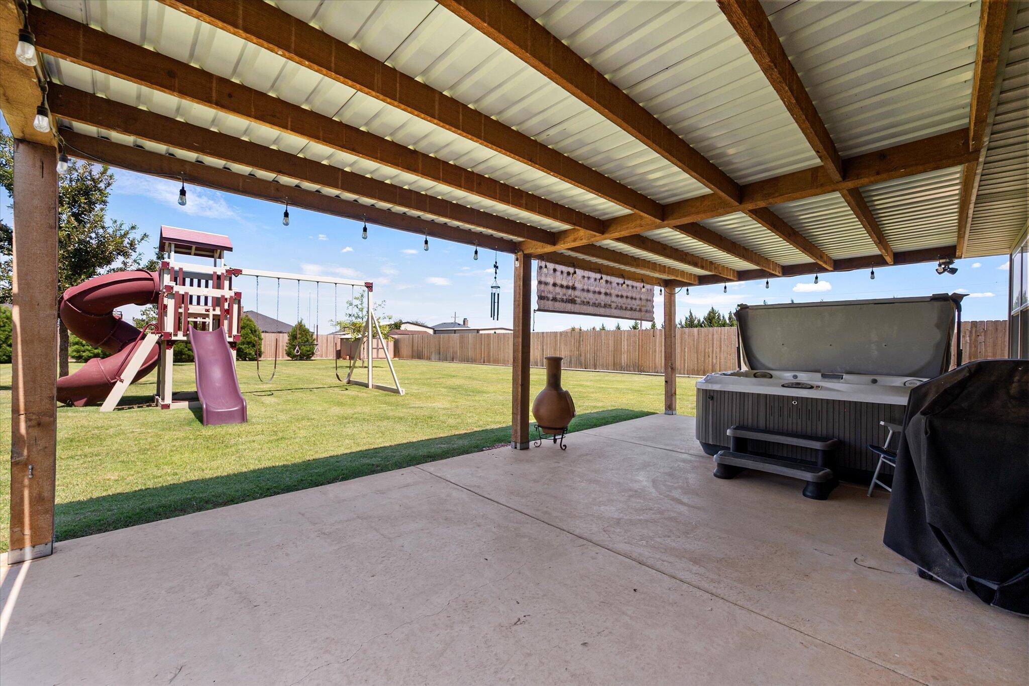3106 128th Street Lubbock, TX 79423 - Photo 38 of 44 a view of a house with backyard and a patio