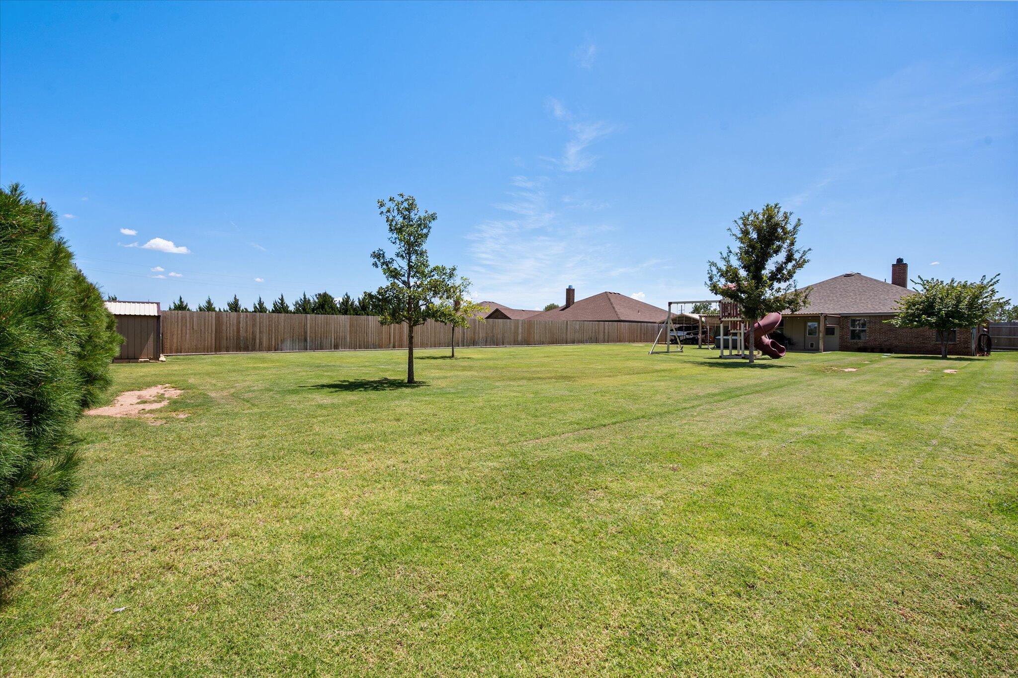 3106 128th Street Lubbock, TX 79423 - Photo 41 of 44 a view of a garden