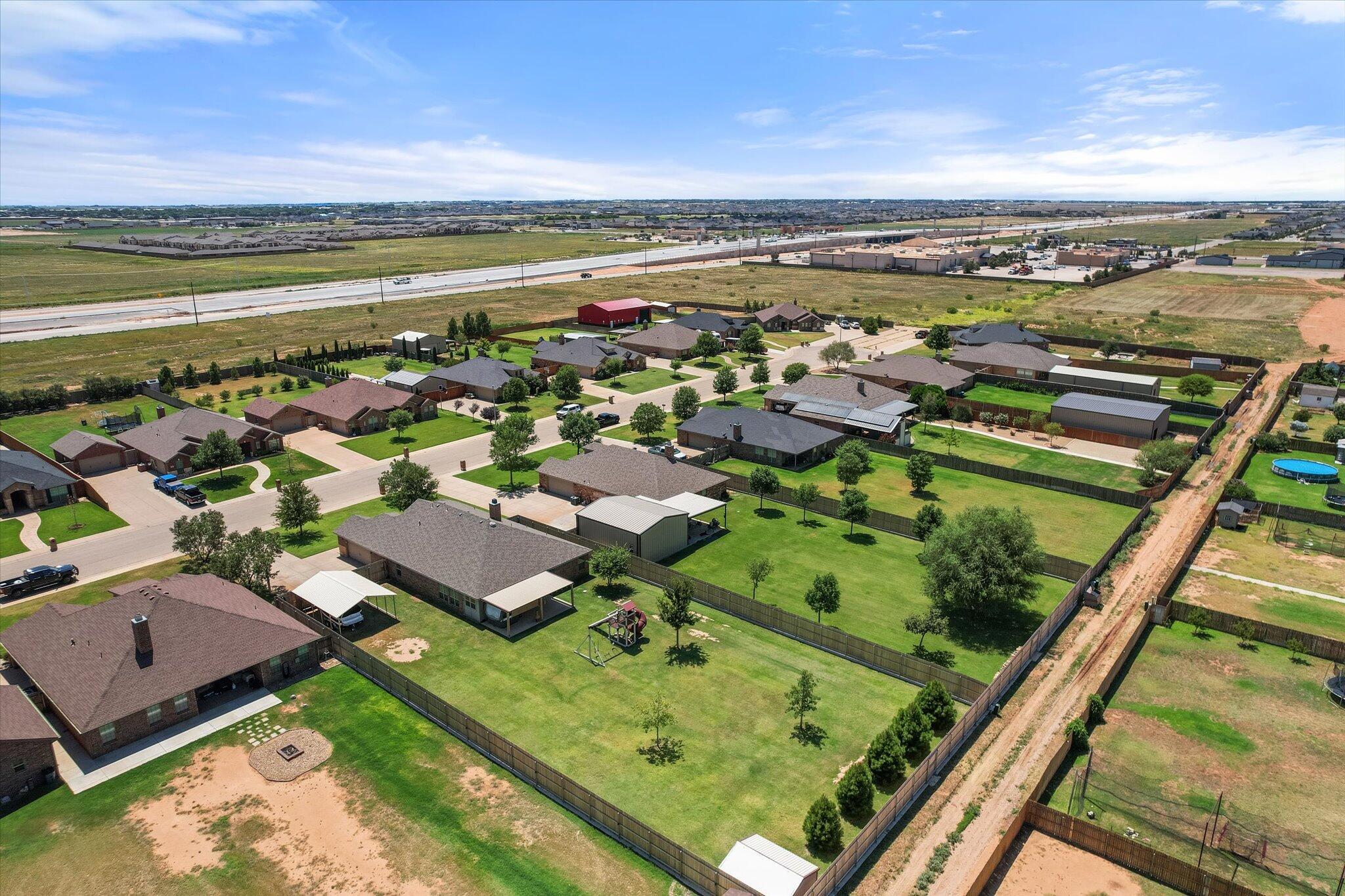 3106 128th Street Lubbock, TX 79423 - Photo 43 of 44 a view of a city from a terrace