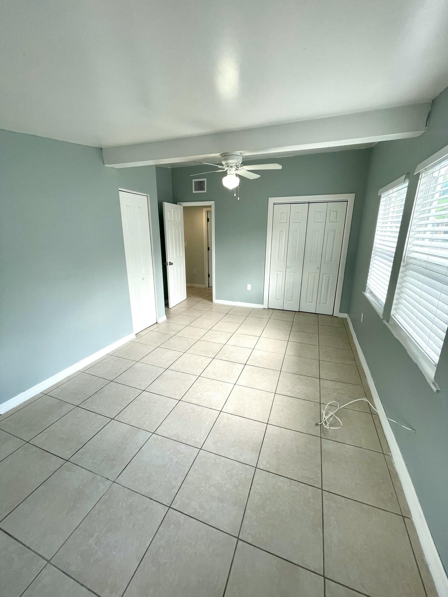 640 54th Street, Unit A West Palm Beach, FL 33407 - Photo 9 of 13 a view of an empty room and window