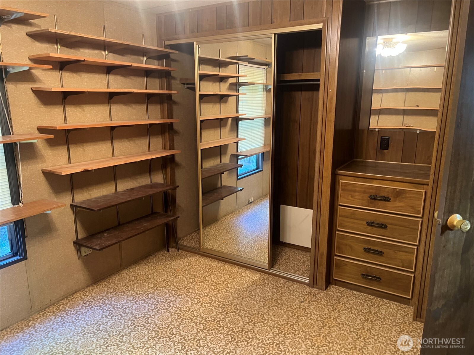 6402 154th Street Northwest, Unit 40 Gig Harbor, WA 98332 - Photo 20 of 23 a view of walk in closet with empty racks