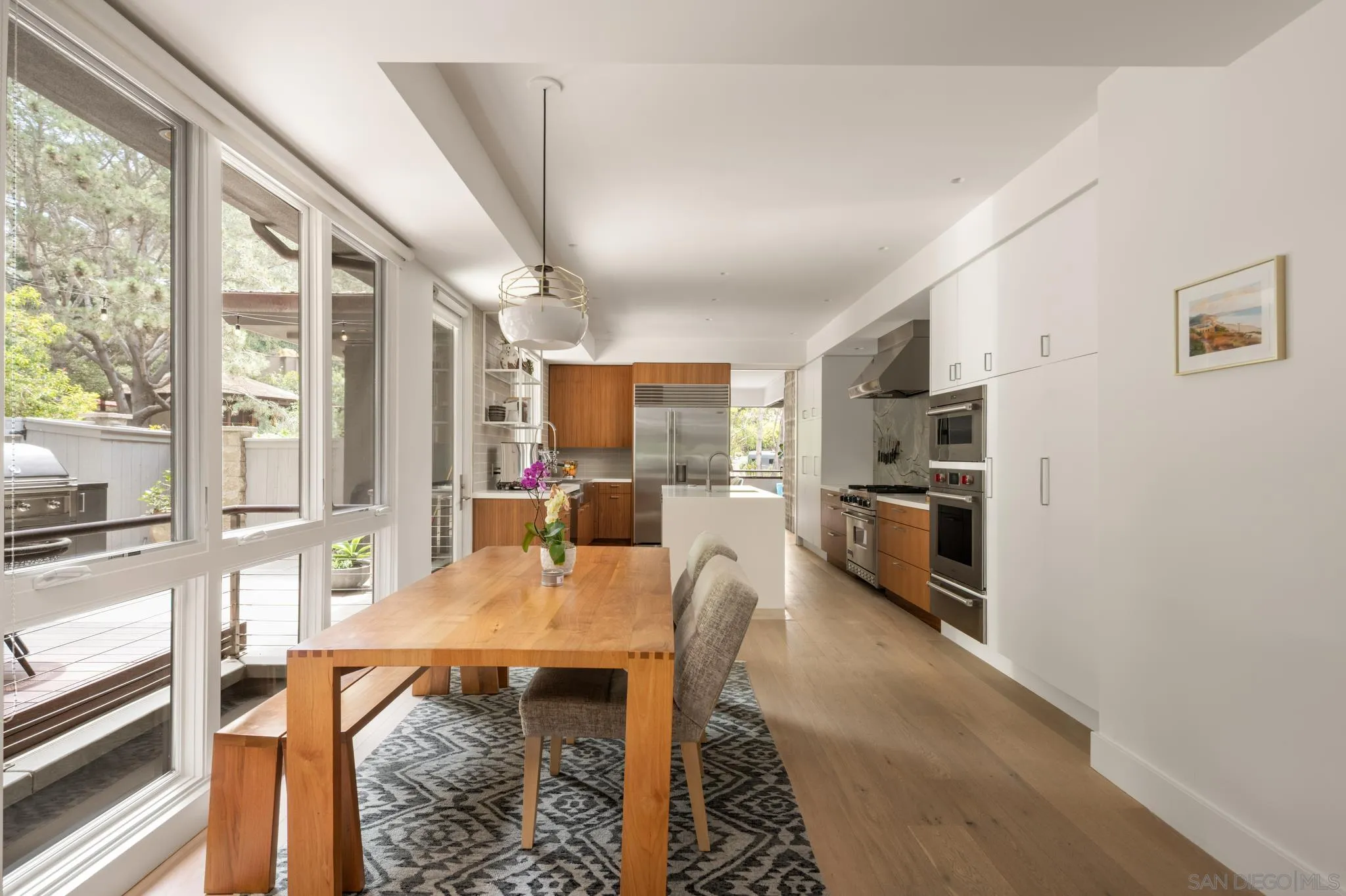 404 Pine Needles Drive Del Mar, CA 92014 - Photo 11 of 71 a view of a dining room with furniture window and wooden floor