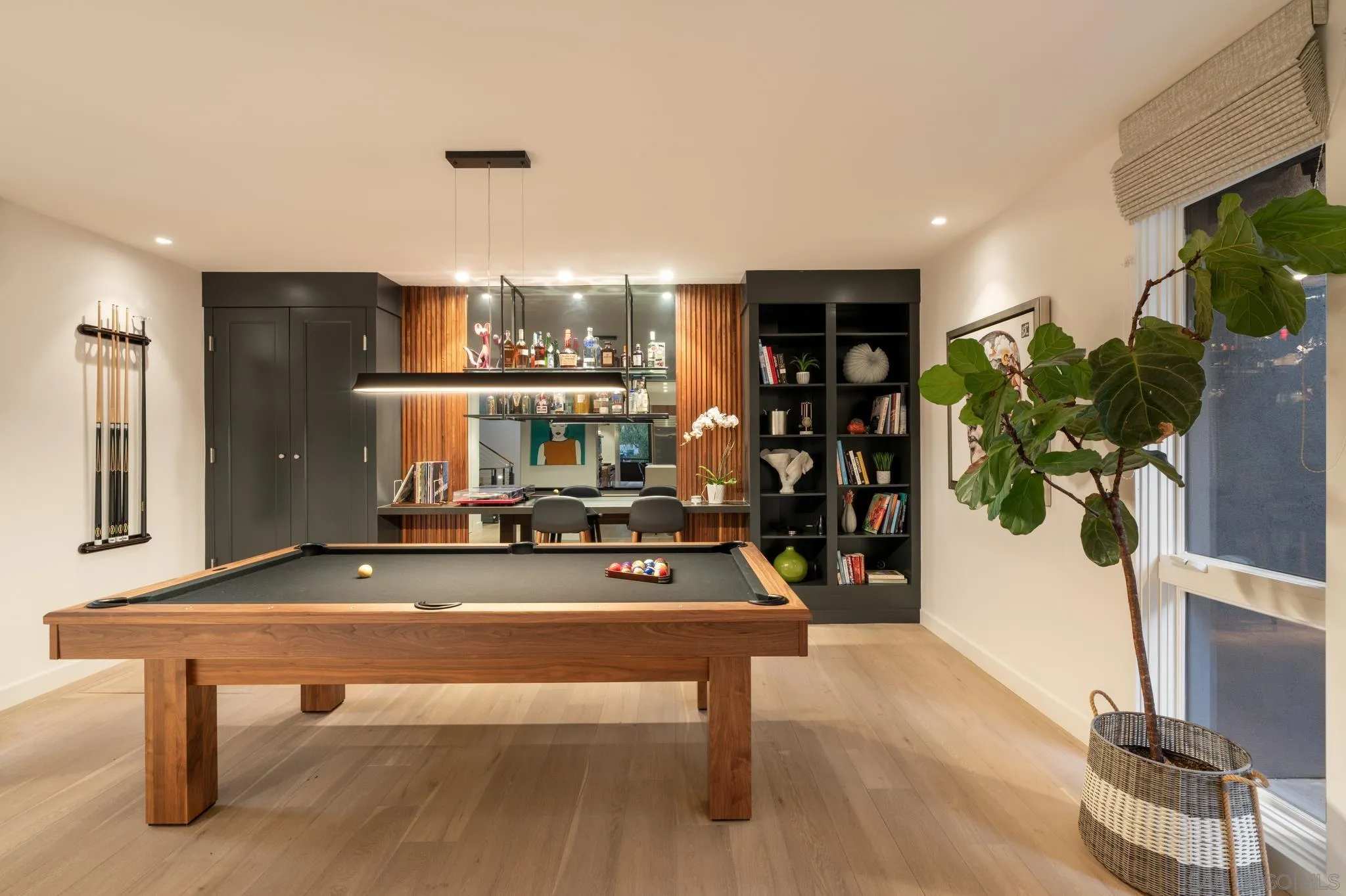 404 Pine Needles Drive Del Mar, CA 92014 - Photo 12 of 71 a room with gym equipment and a table