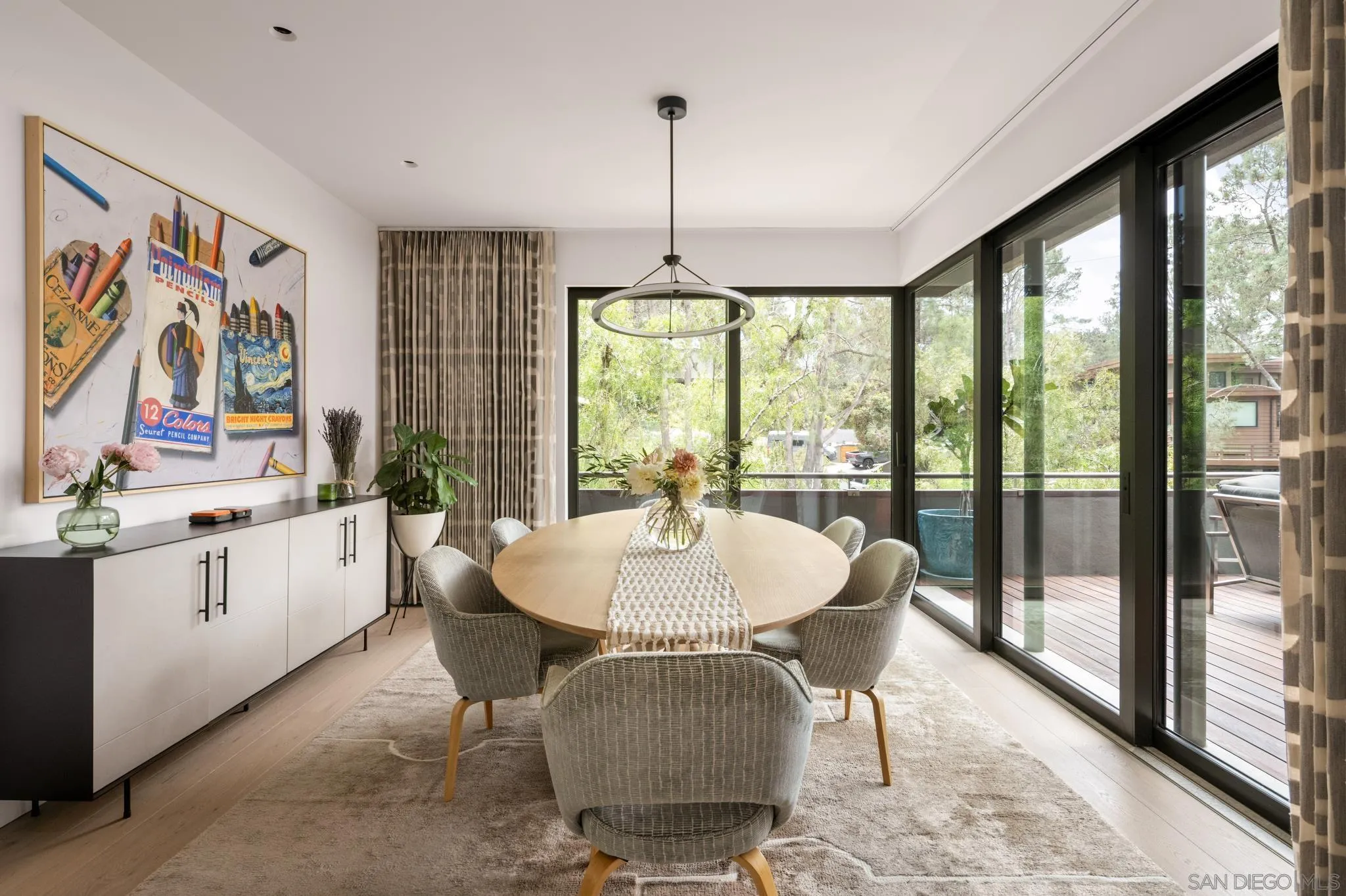 404 Pine Needles Drive Del Mar, CA 92014 - Photo 16 of 71 a dining room with furniture a chandelier and wooden floor