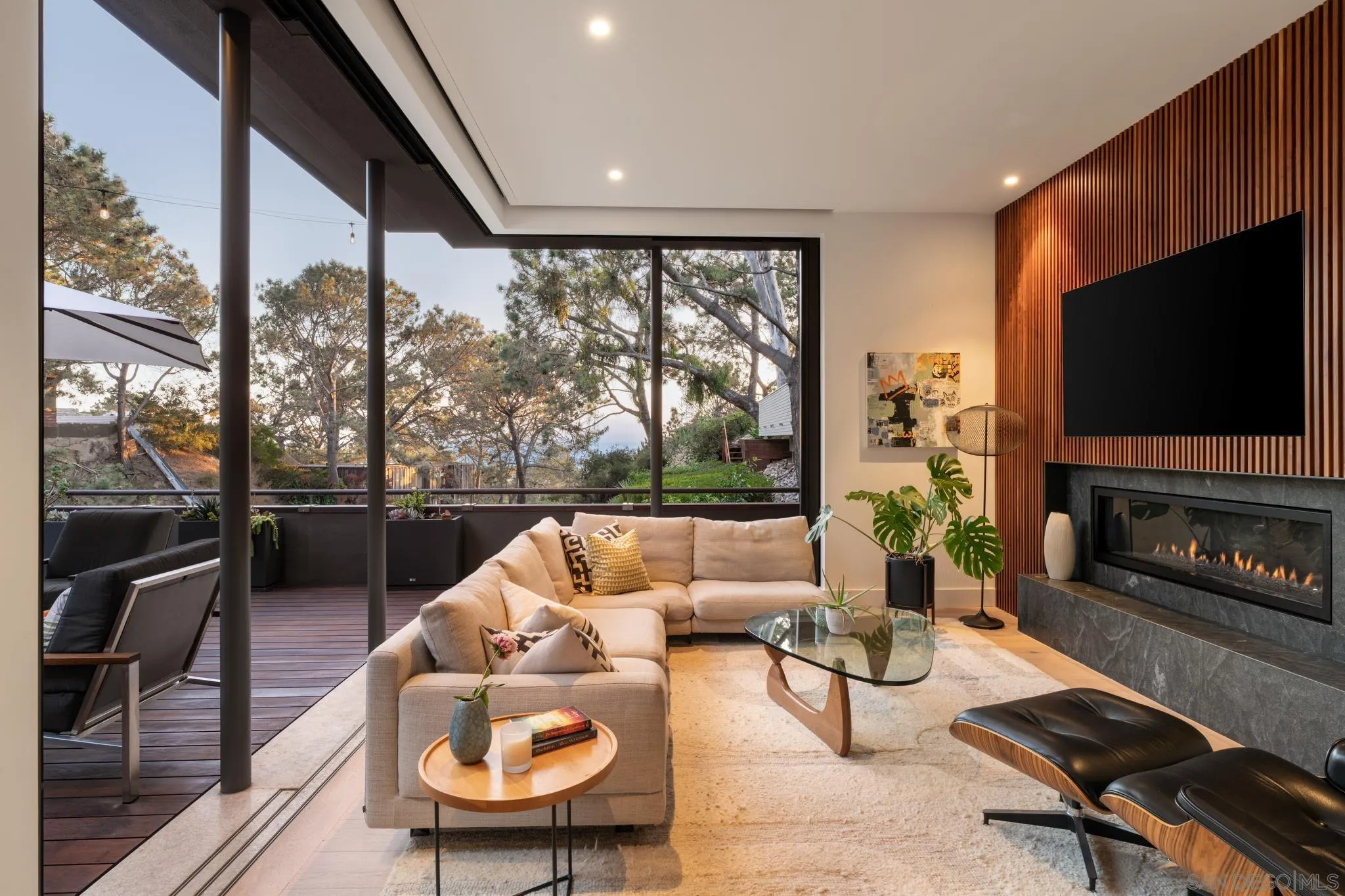 404 Pine Needles Drive Del Mar, CA 92014 - Photo 2 of 71 a living room with furniture a flat screen tv and a floor to ceiling window