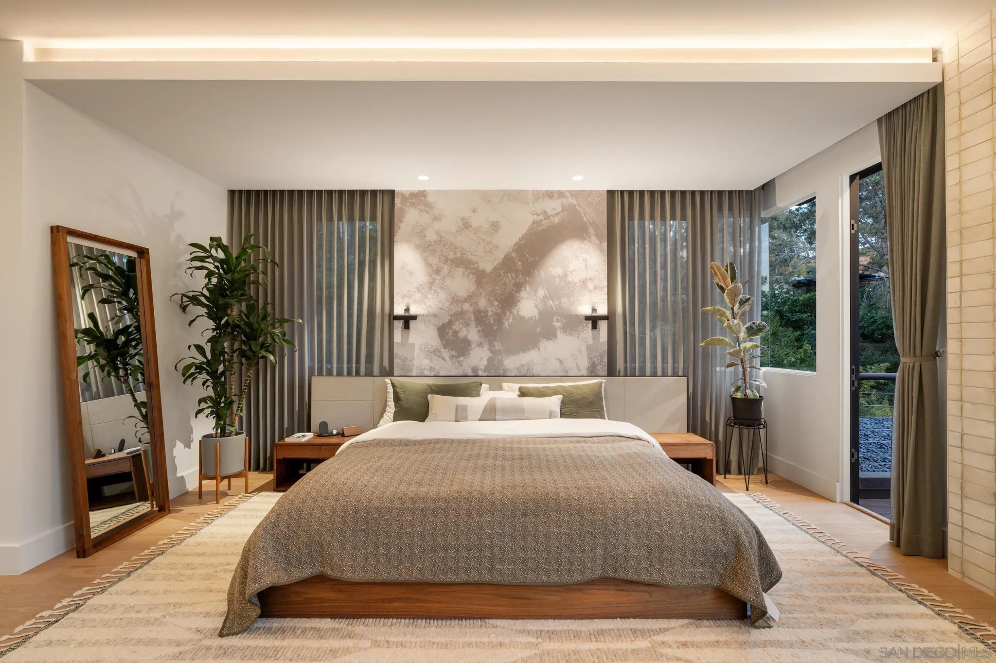 404 Pine Needles Drive Del Mar, CA 92014 - Photo 22 of 71 a bedroom with a large bed and a large window