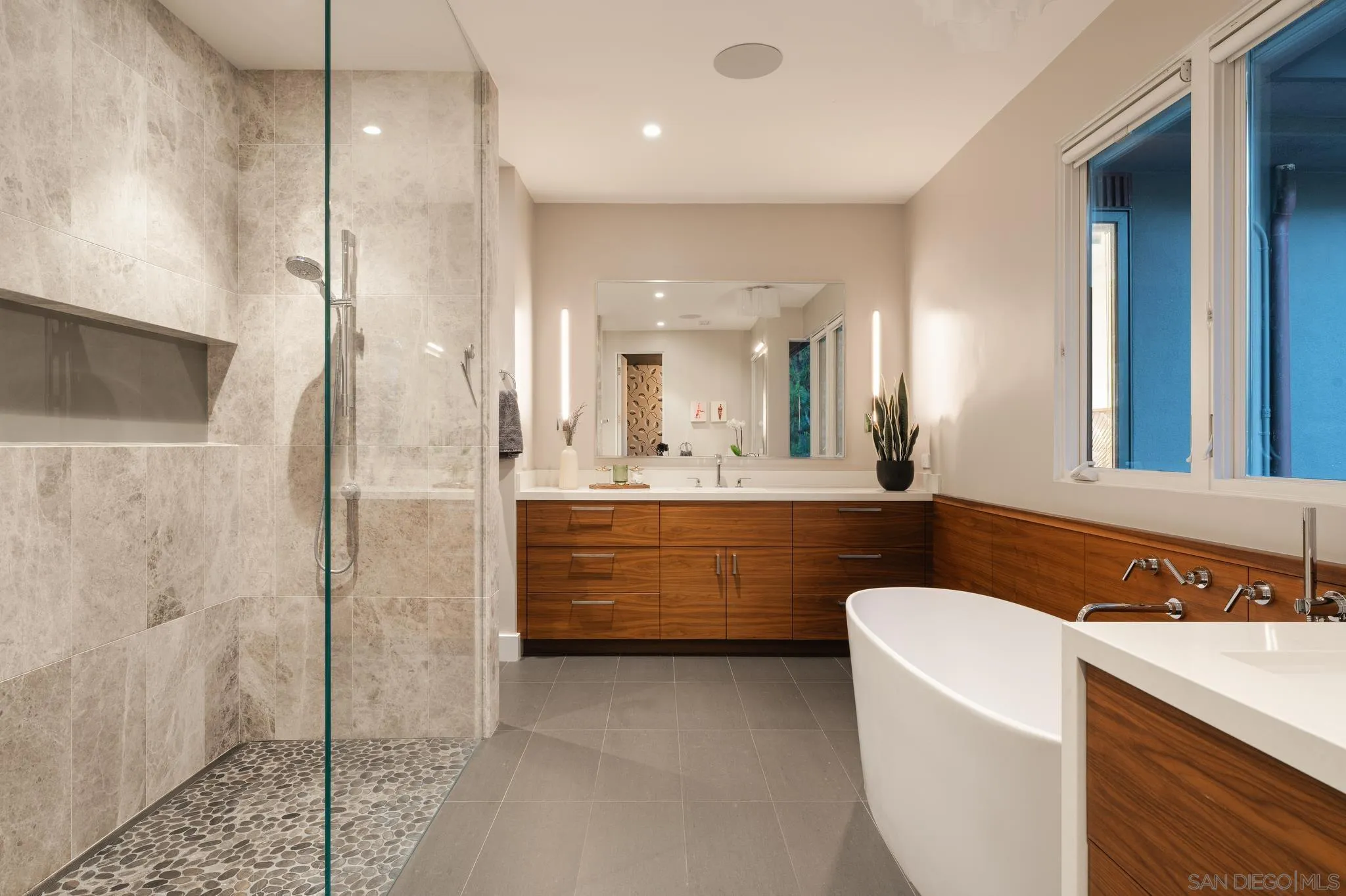 404 Pine Needles Drive Del Mar, CA 92014 - Photo 27 of 71 a bathroom with a double vanity sink mirror and shower