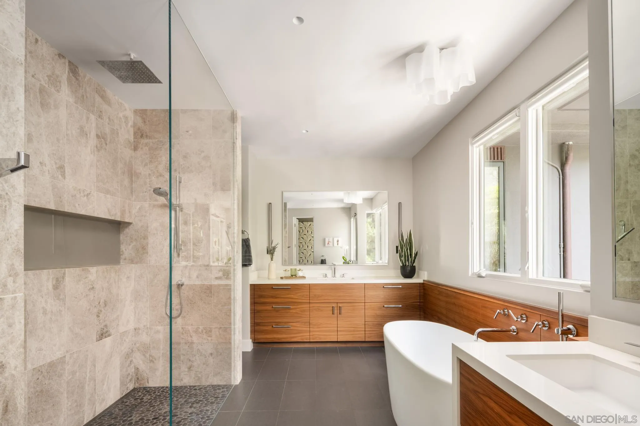 404 Pine Needles Drive Del Mar, CA 92014 - Photo 29 of 71 a bathroom with a double vanity sink mirror and bathtub