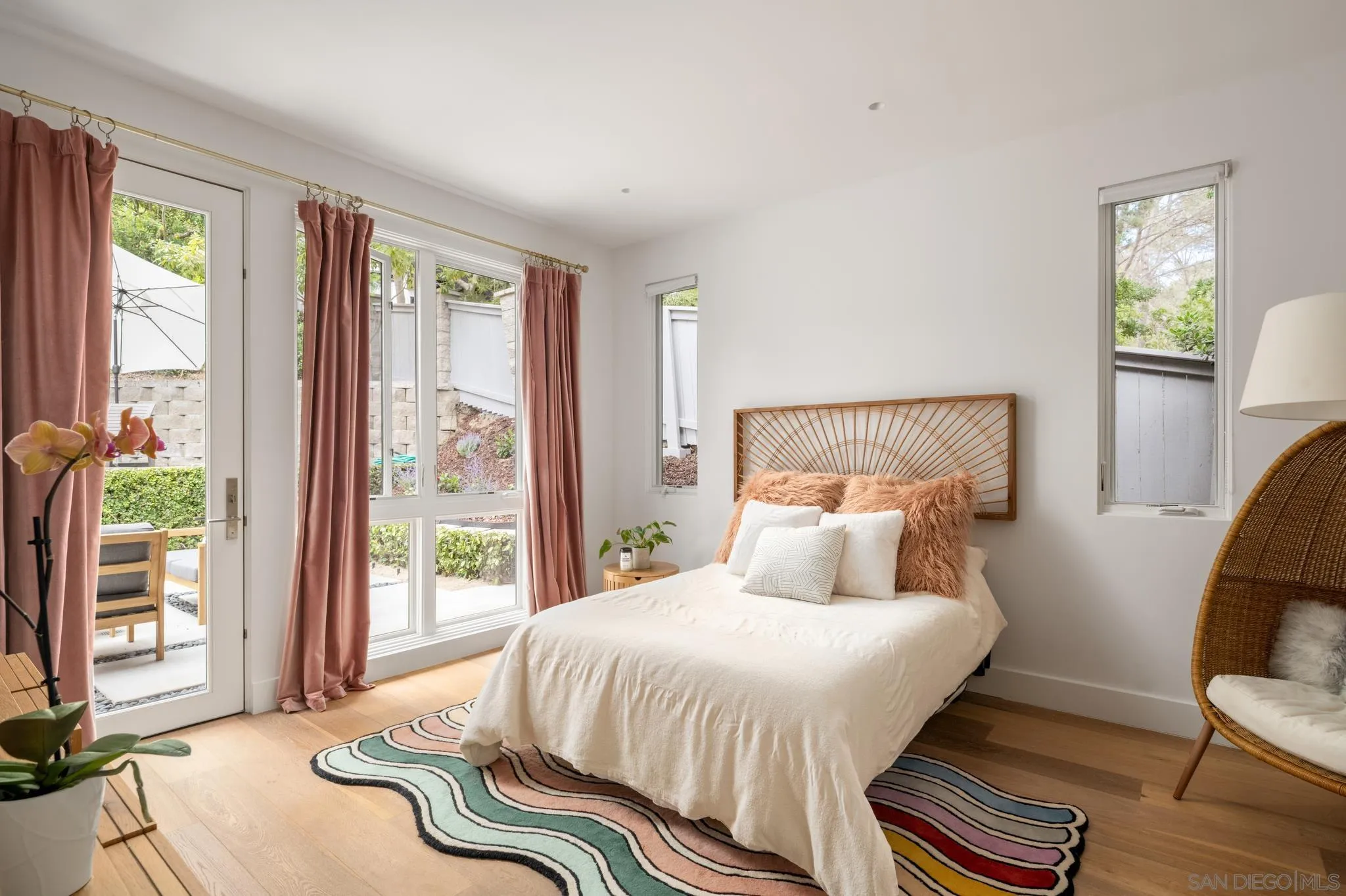 404 Pine Needles Drive Del Mar, CA 92014 - Photo 33 of 71 a bedroom with a bed and wooden floor