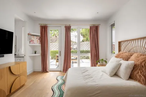 a living room with a flat screen tv