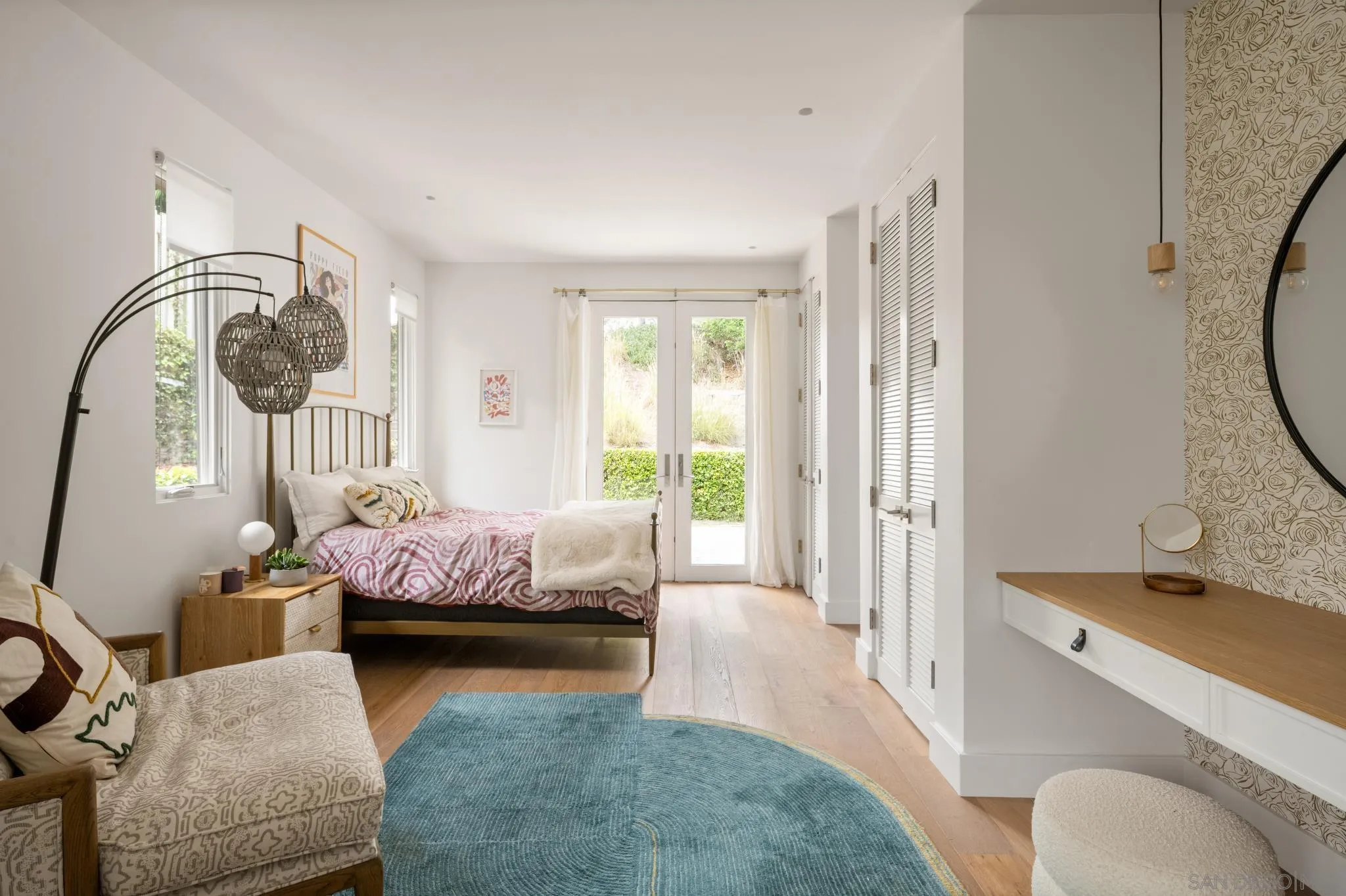 404 Pine Needles Drive Del Mar, CA 92014 - Photo 38 of 71 a bedroom with a bed and a chandelier