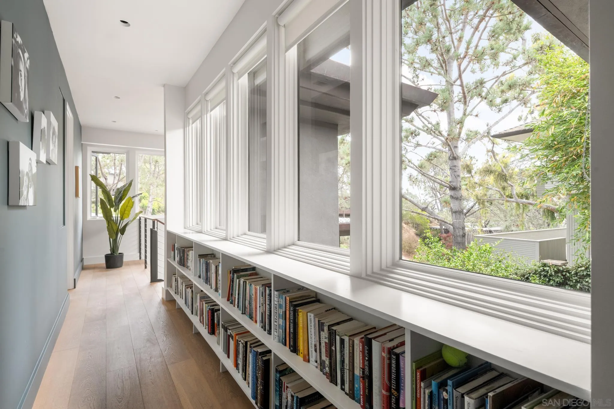 404 Pine Needles Drive Del Mar, CA 92014 - Photo 40 of 71 a view of an entryway with wooden floor and windows