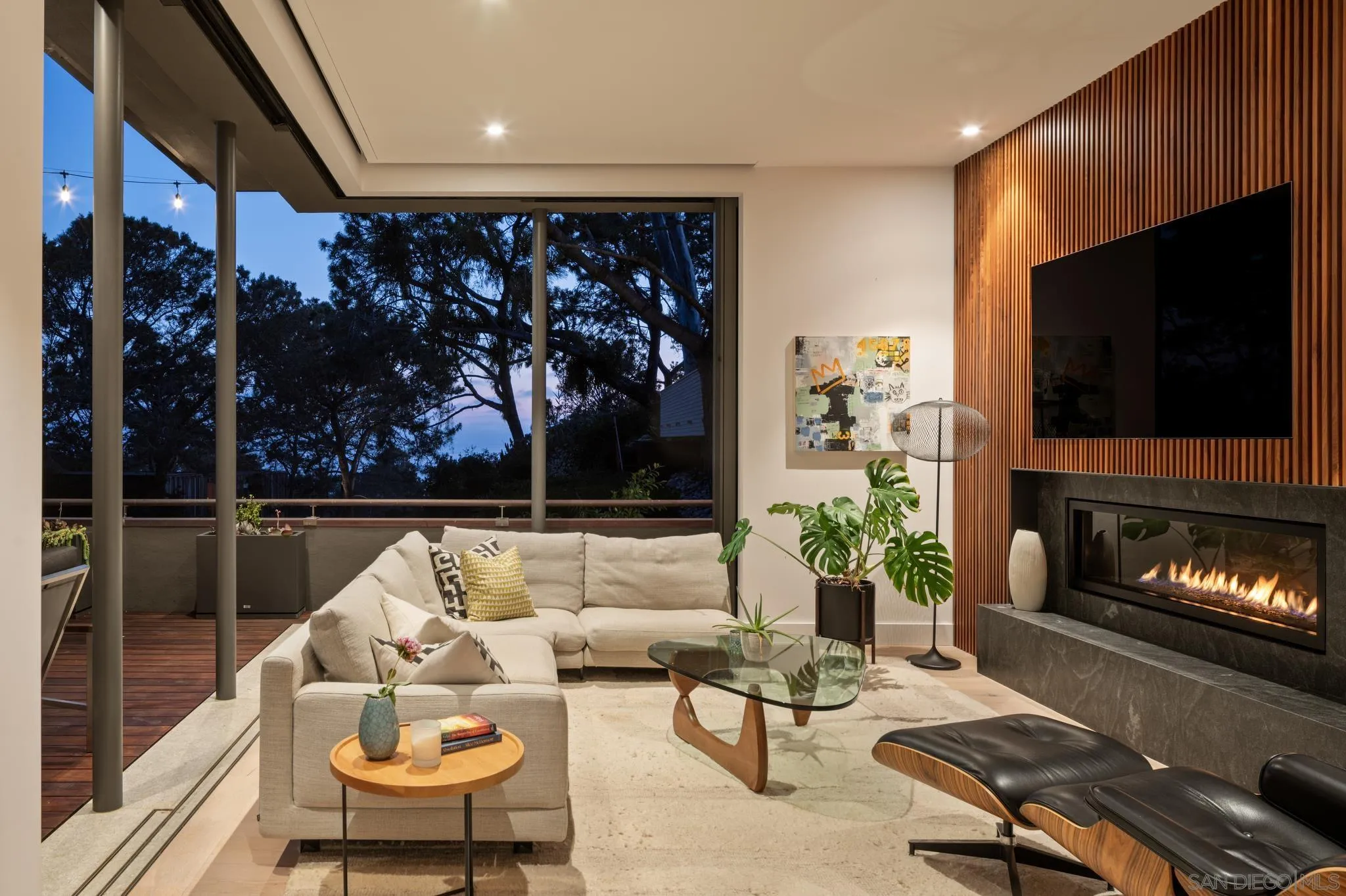404 Pine Needles Drive Del Mar, CA 92014 - Photo 49 of 71 a living room with fireplace furniture and a flat screen tv