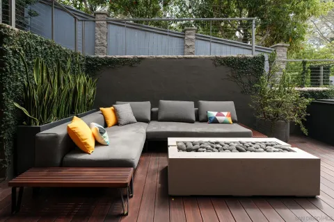 a stove top oven sitting inside of a kitchen