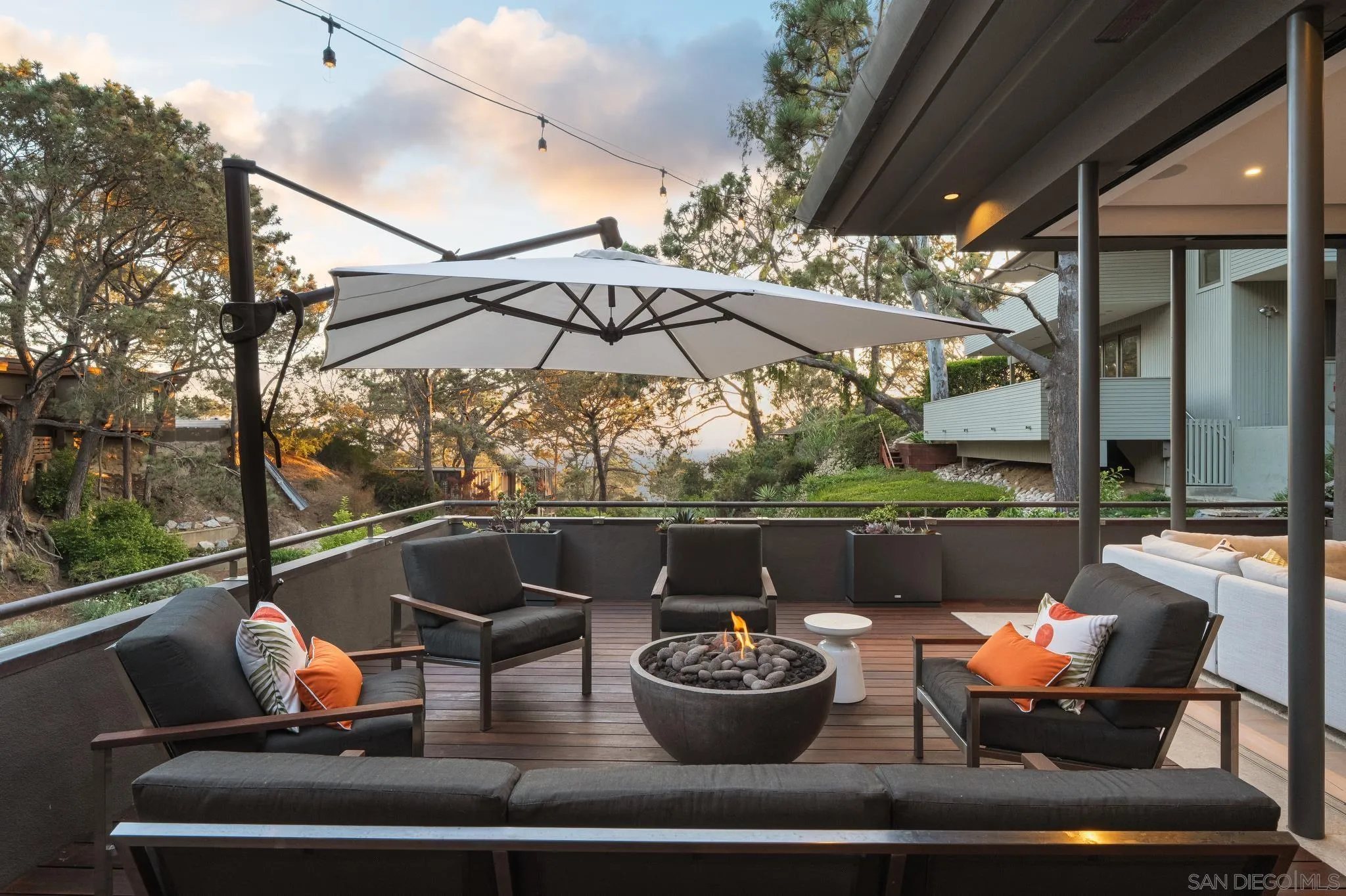 404 Pine Needles Drive Del Mar, CA 92014 - Photo 63 of 71 a view of a patio with couches chairs and a potted plant
