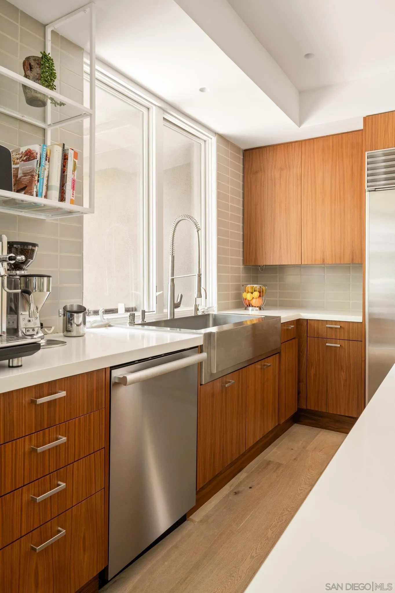 404 Pine Needles Drive Del Mar, CA 92014 - Photo 70 of 71 a kitchen with stainless steel appliances granite countertop a sink a stove cabinets and wooden floor