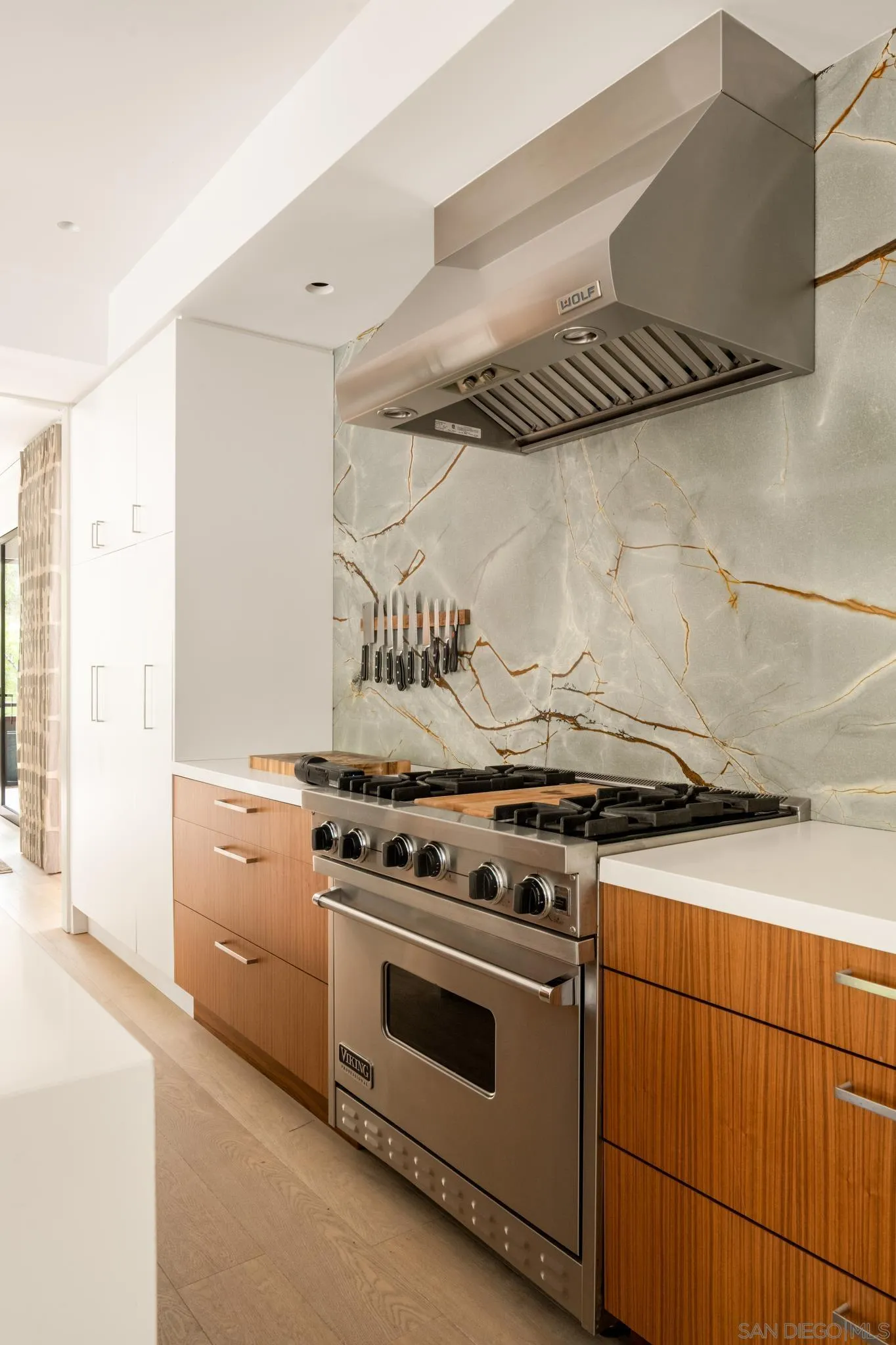 404 Pine Needles Drive Del Mar, CA 92014 - Photo 71 of 71 a stove top oven sitting inside of a kitchen