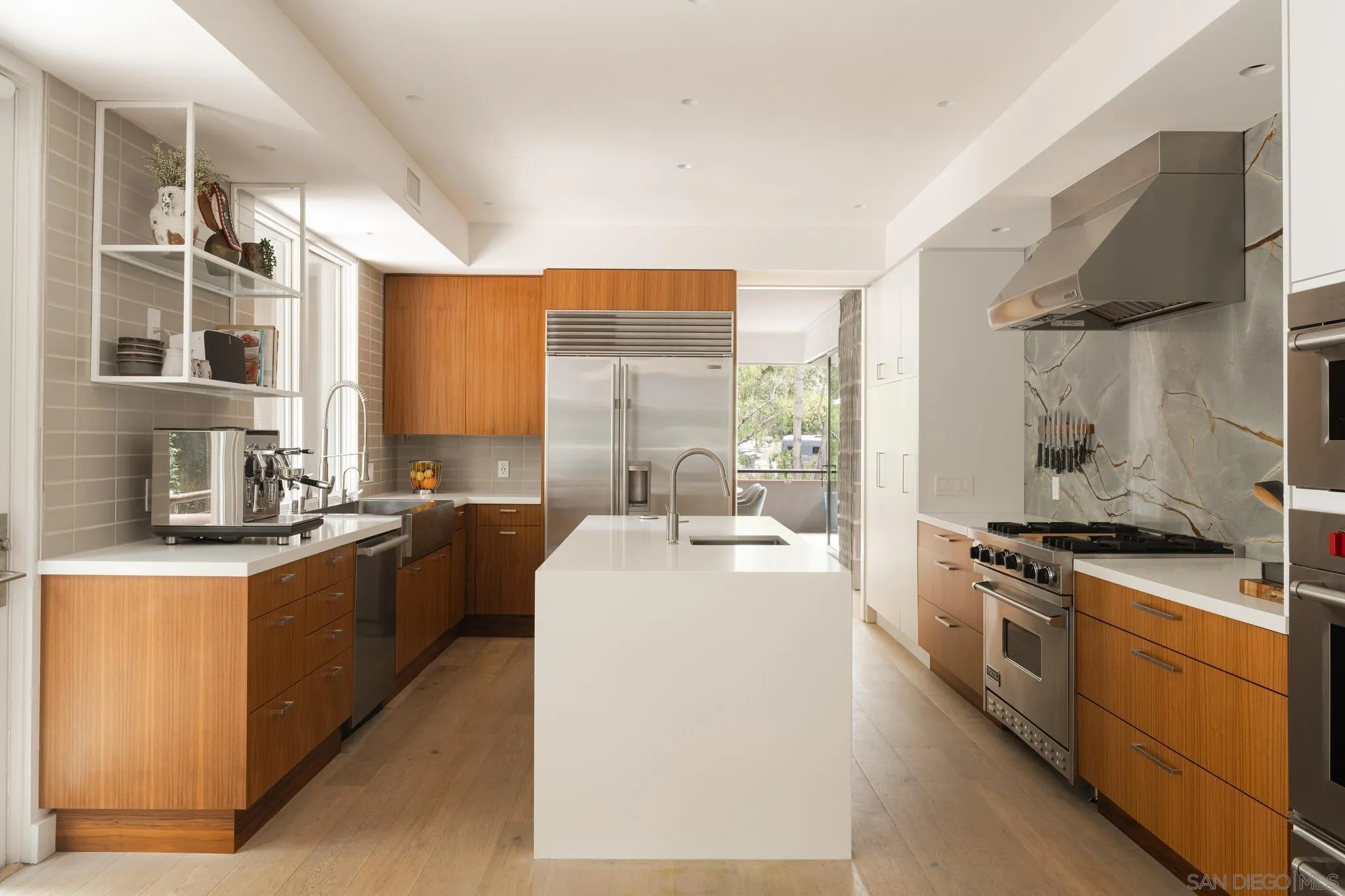 404 Pine Needles Drive Del Mar, CA 92014 - Photo 8 of 71 a kitchen with stainless steel appliances granite countertop a stove a sink and a refrigerator