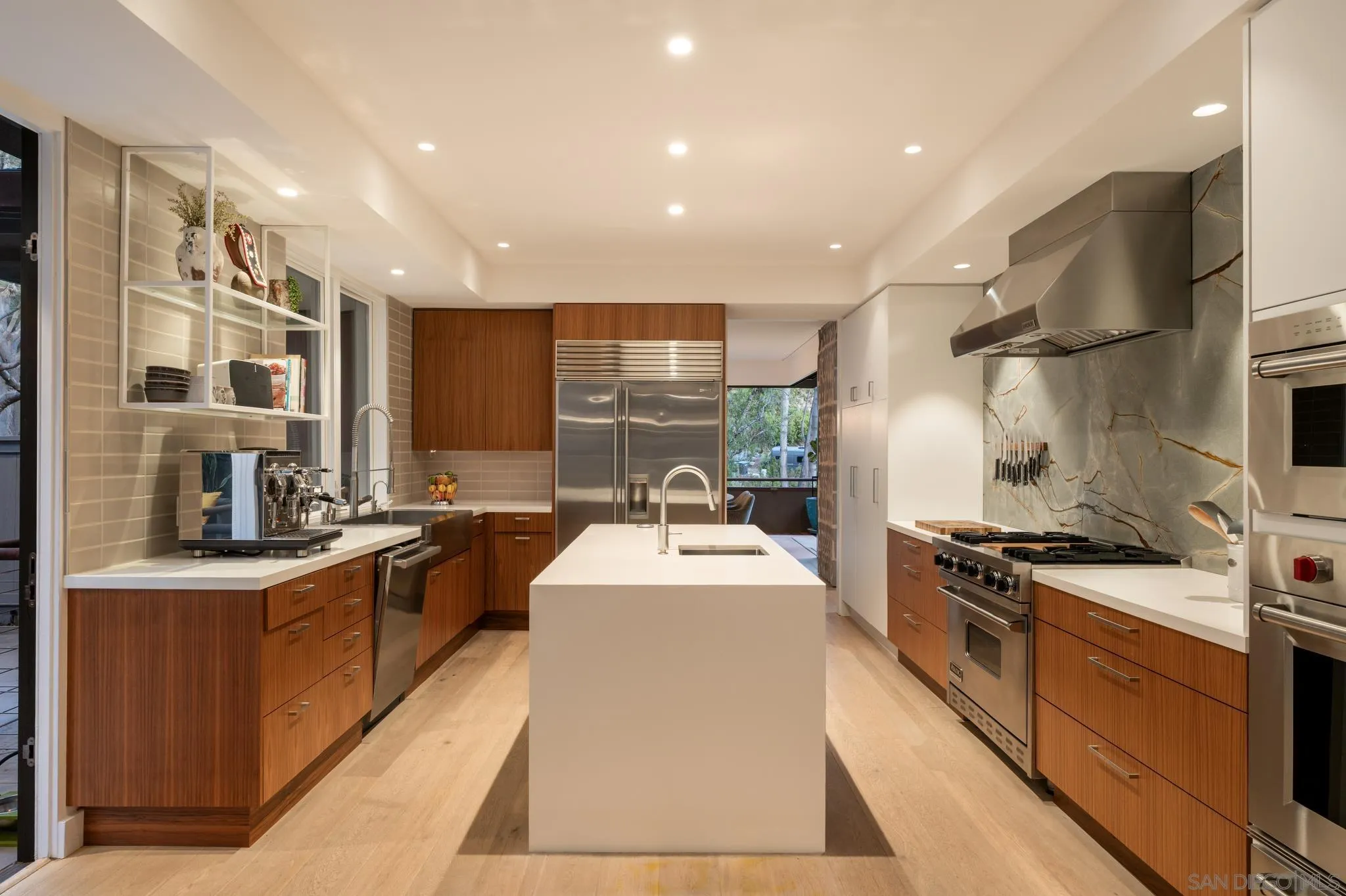 404 Pine Needles Drive Del Mar, CA 92014 - Photo 10 of 71 a kitchen with stainless steel appliances granite countertop a sink stove and refrigerator