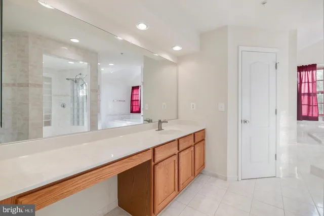 a view of a room with gym equipment and windows