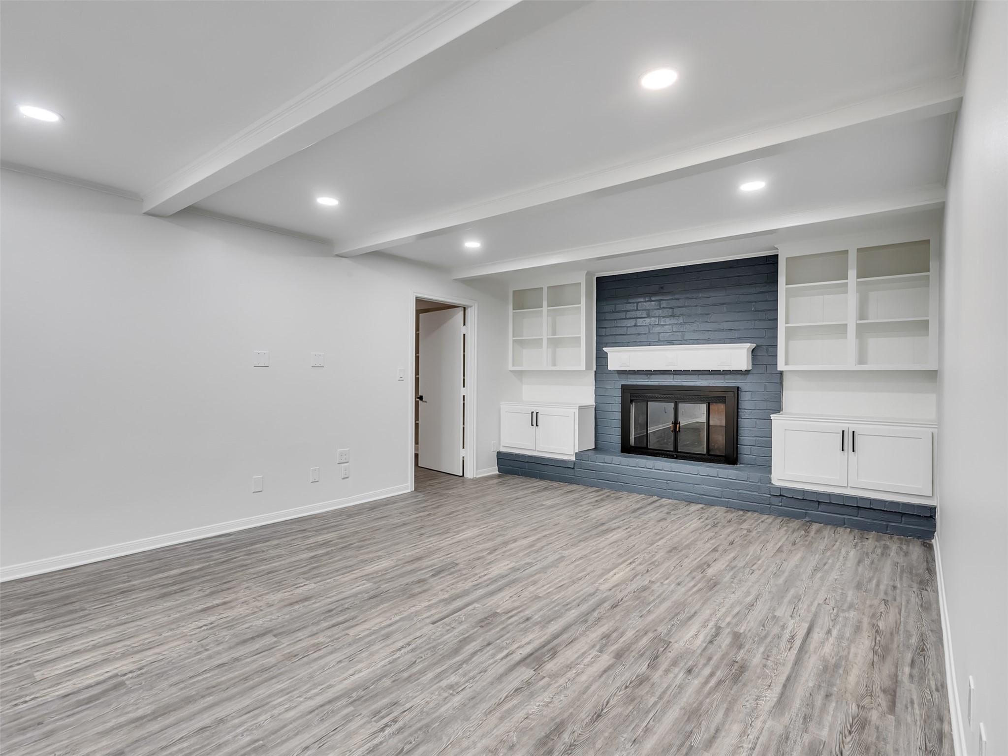 4023 Laverock Road Spring, TX 77388 - Photo 15 of 36 Fireplace with brick accented wall