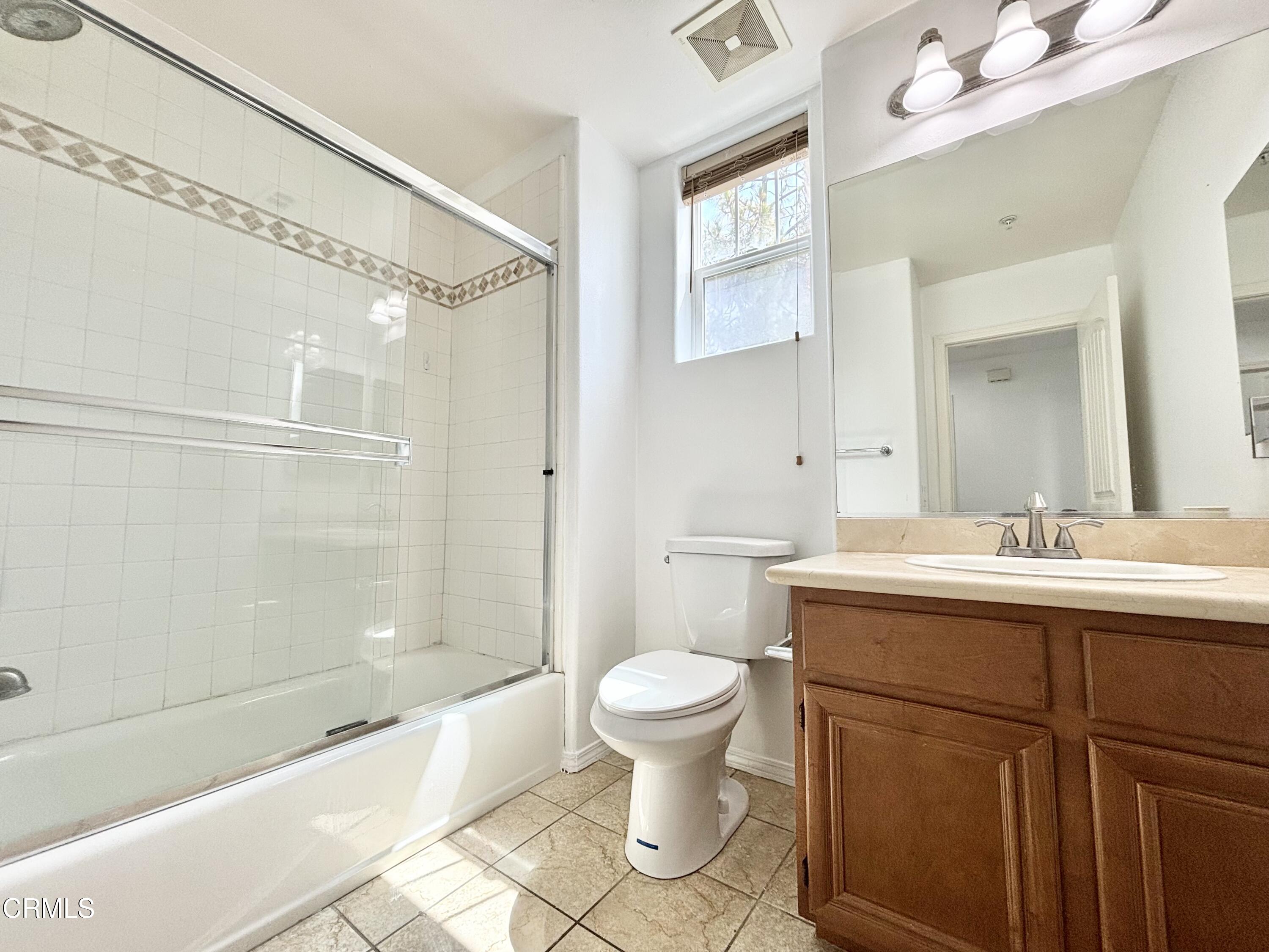 1544 Windshore Way Oxnard, CA 93035 - Photo 18 of 27 a bathroom with a sink a toilet and shower