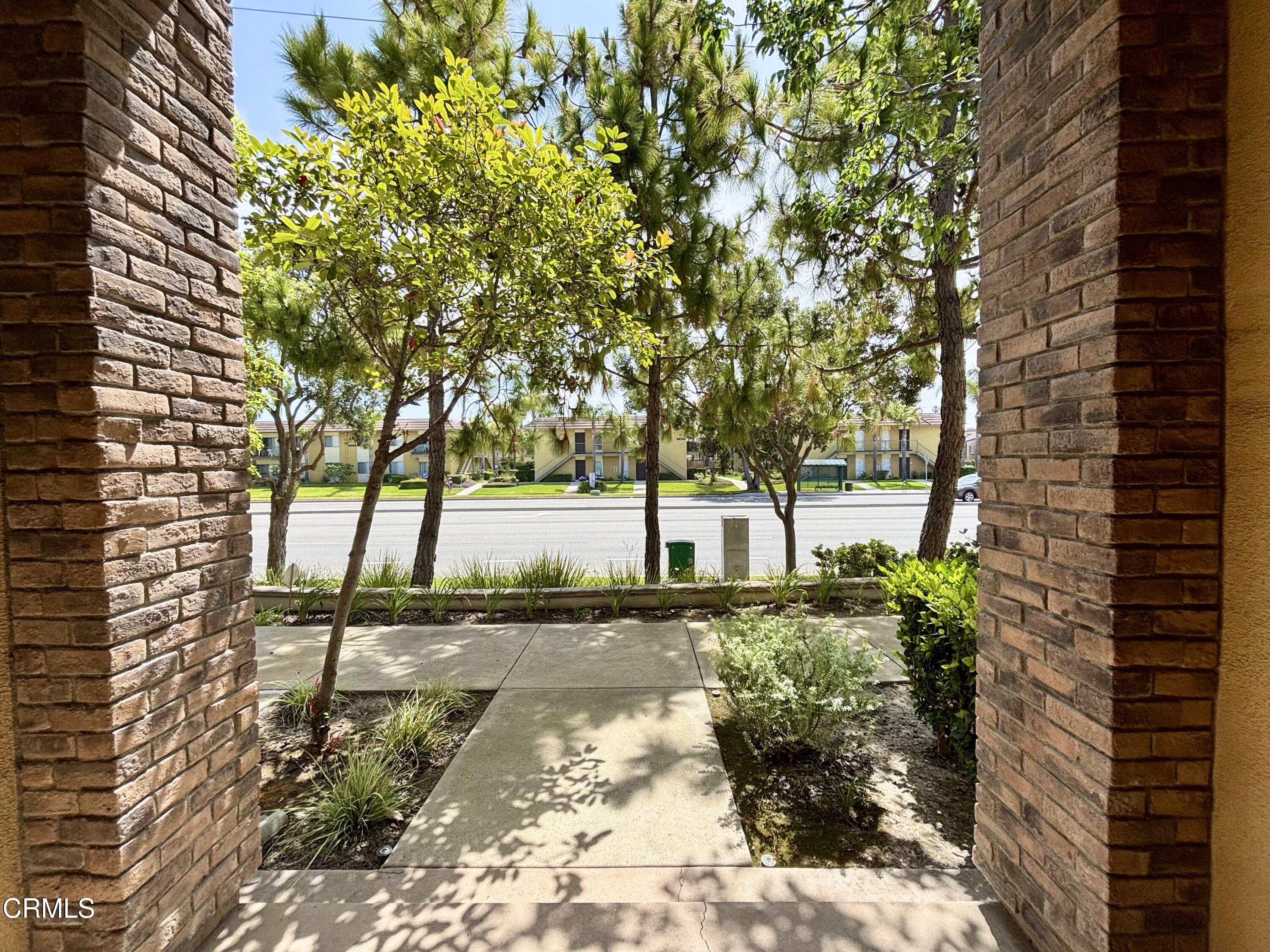 1544 Windshore Way Oxnard, CA 93035 - Photo 24 of 27 a view of a pathway of a house with a yard