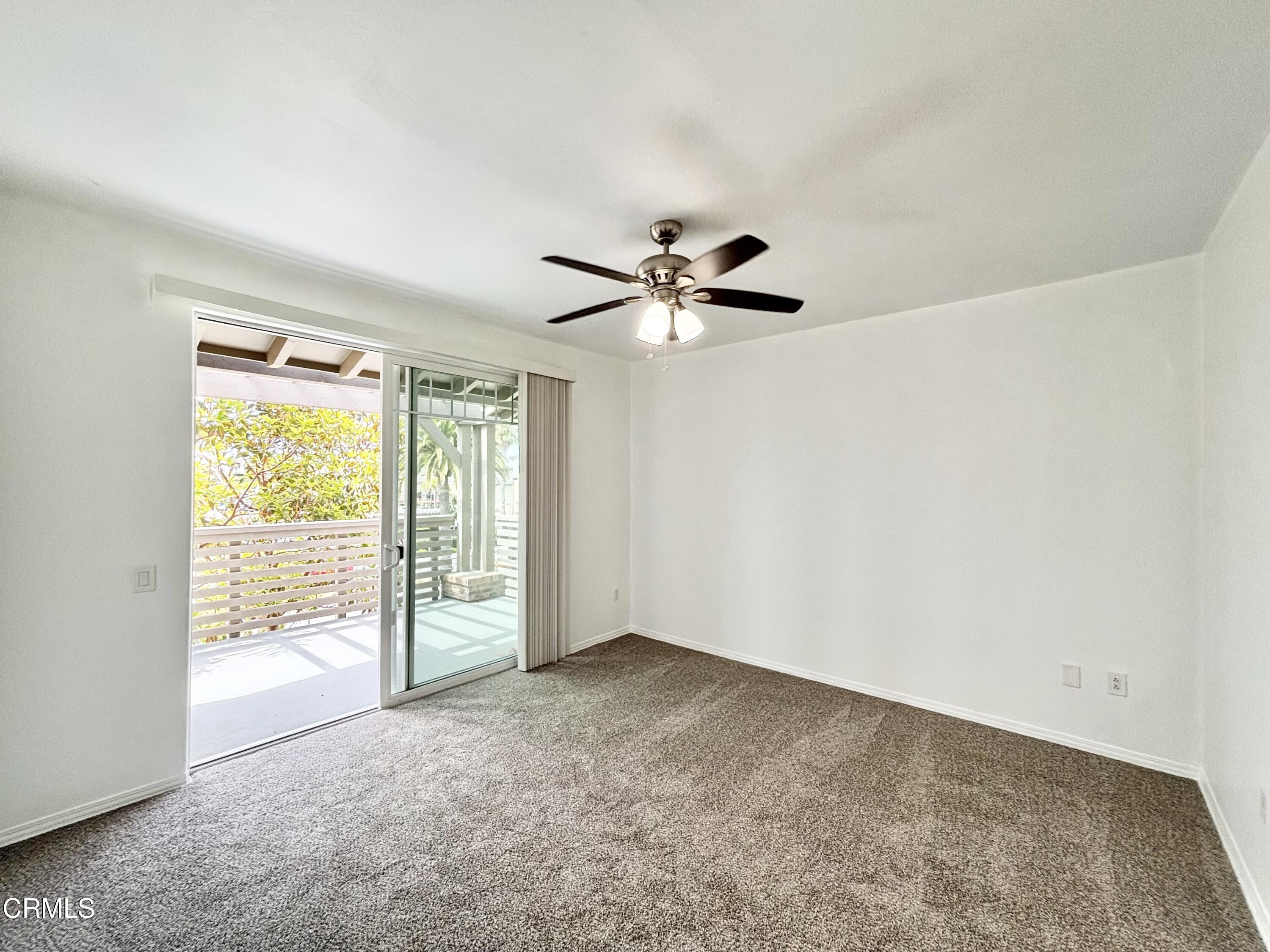 1544 Windshore Way Oxnard, CA 93035 - Photo 9 of 27 a view of an empty room with a window