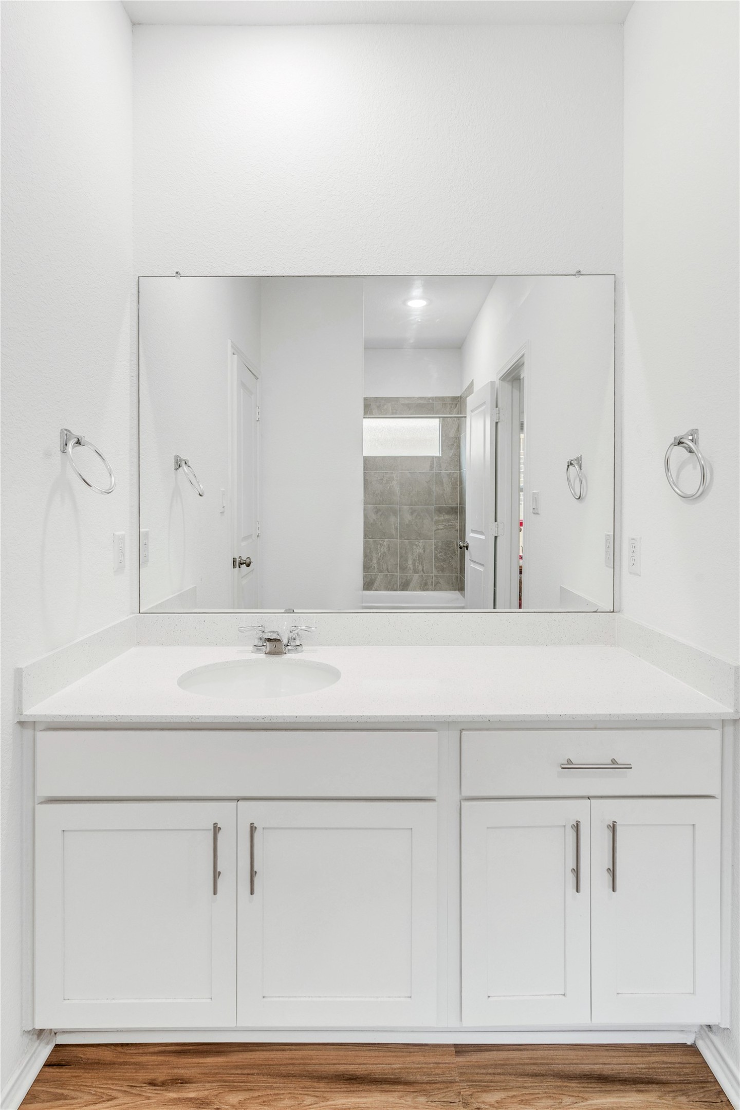212 Saddle Mountain Road Georgetown, TX 78628 - Photo 23 of 38 a bathroom with a sink and a mirror