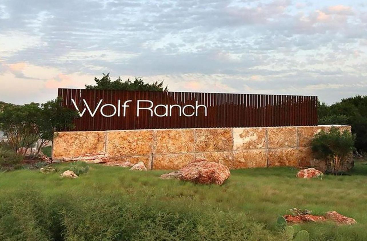 212 Saddle Mountain Road Georgetown, TX 78628 - Photo 31 of 38 a view of outdoor space with sign board and garden